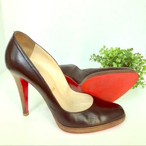 Christian Louboutin wood stacked black heels
